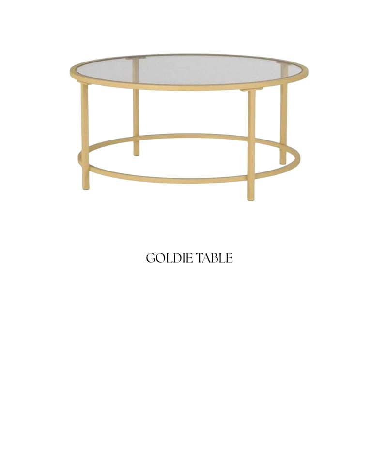 Goldie Table: round coffee table with gold metal frame and glass top