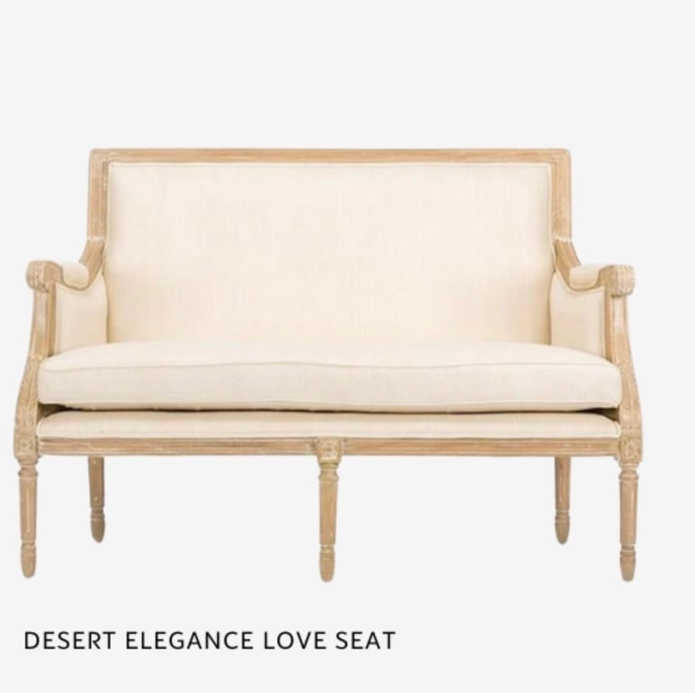 Desert Elegance Love Seat with light wood frame and cream cushioned seating