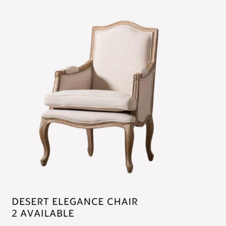 Desert Elegance upholstered wingback chair with curved wooden legs and beige cushioned seat