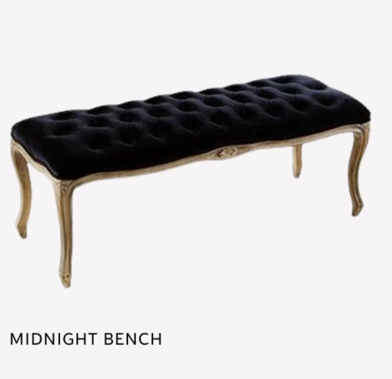 Midnight Bench with black tufted velvet seat and carved wooden frame in natural finish